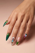 Emerald Heir press-on nails on hand model